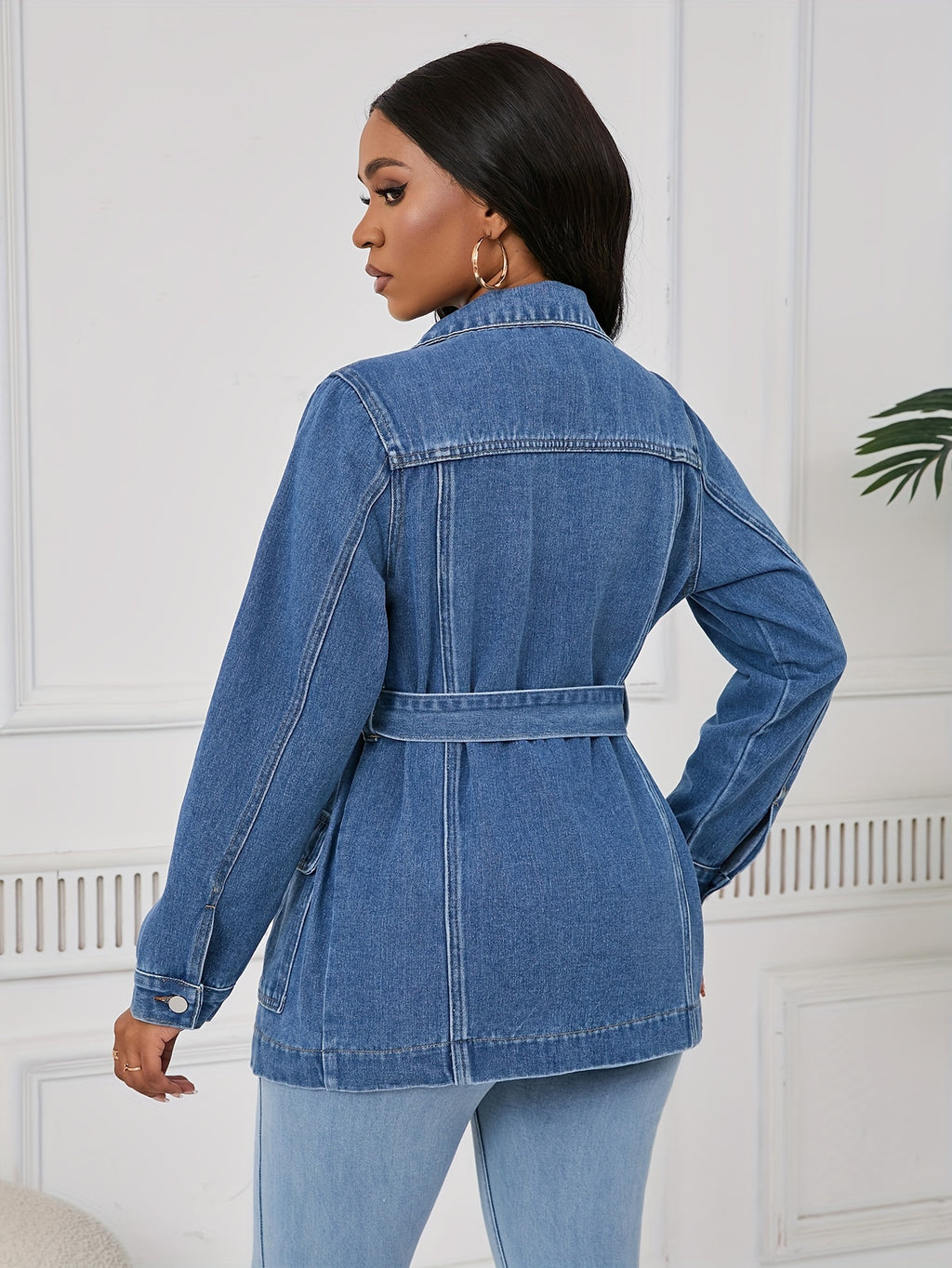 Mid-Length Denim Jacket for Women with a Belt And Four Pockets.