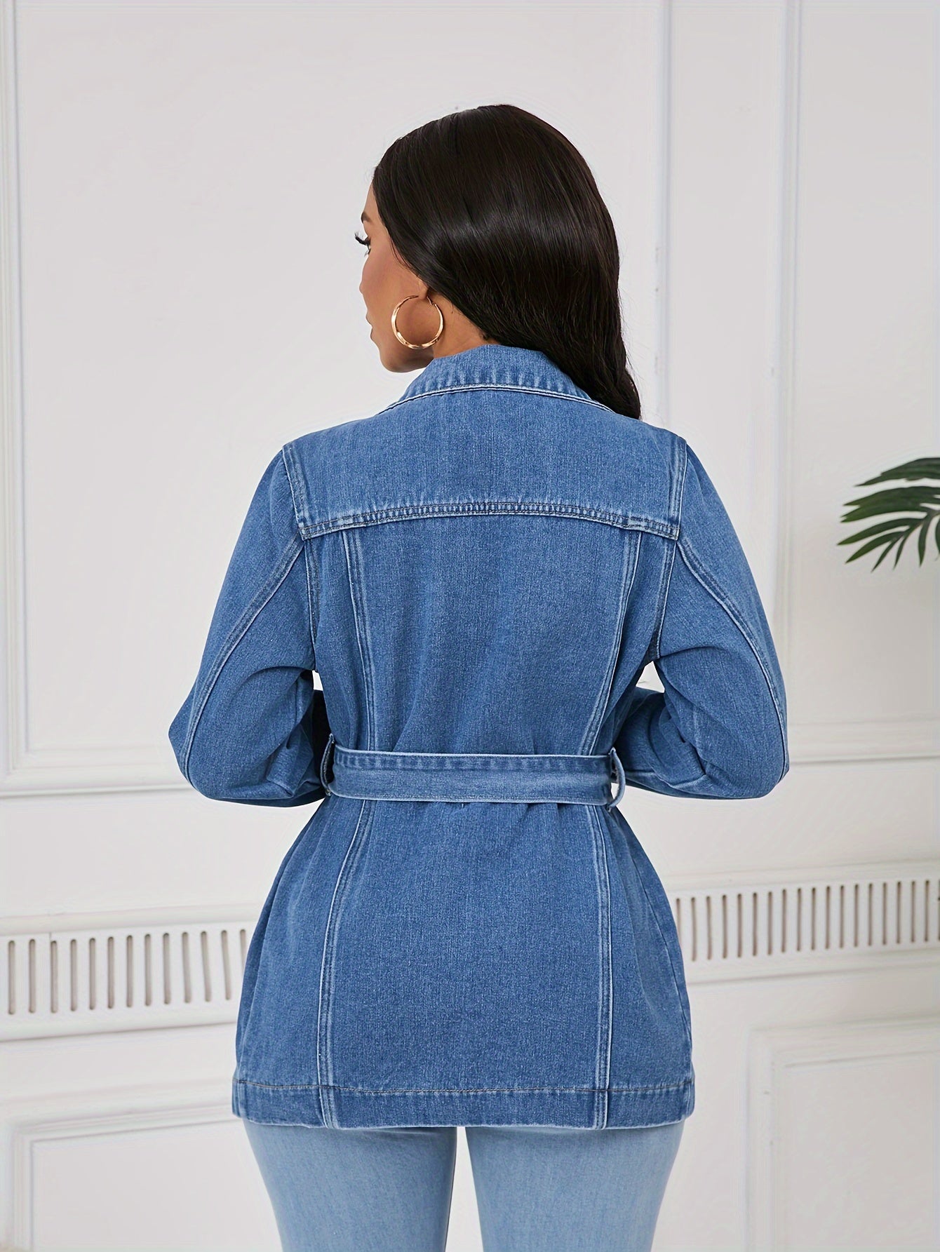Mid-Length Denim Jacket for Women with a Belt And Four Pockets.